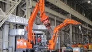 VIDEO, Astaco Hitachi: escavatore con 2 bracci